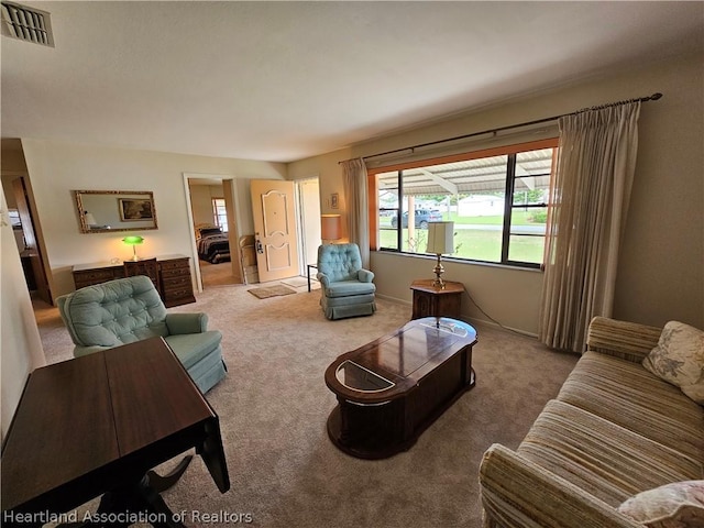 living room featuring light carpet