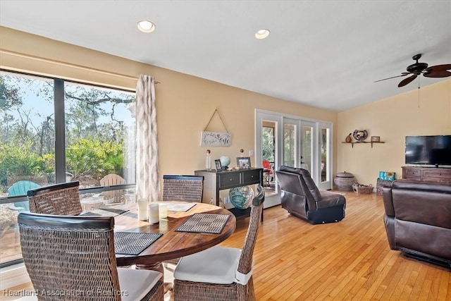 dining room with french doors, lofted ceiling, recessed lighting, a ceiling fan, and hardwood / wood-style floors