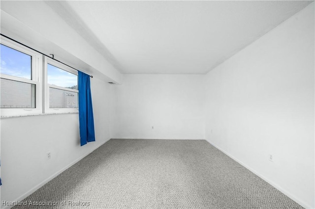 empty room featuring carpet