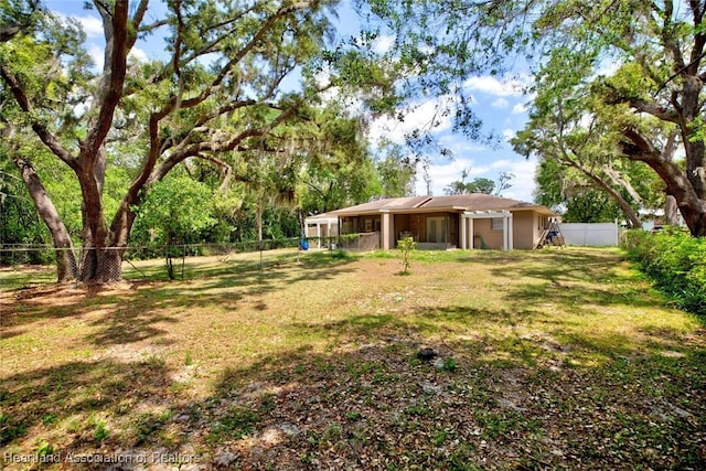 view of yard with a fenced backyard