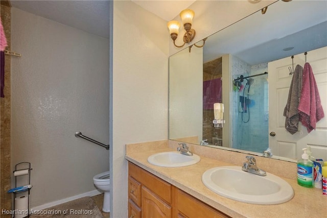4703 Benton St, Lake Wales, FL 33859 - bathroom featuring a shower stall, double vanity, and toilet