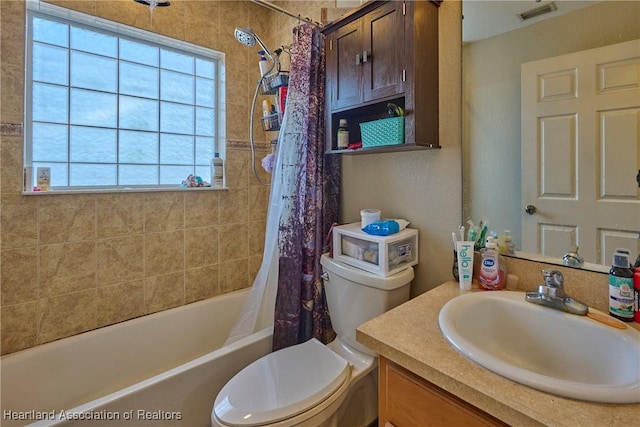 4703 Benton St, Lake Wales, FL 33859 - full bathroom with toilet, shower / bath combo with shower curtain, and vanity