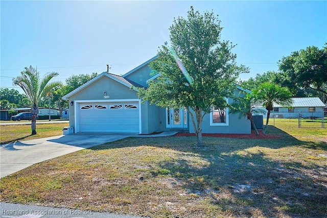 4703 Benton St, Lake Wales, FL 33859 - view of front of property with a garage, driveway, and stucco siding
