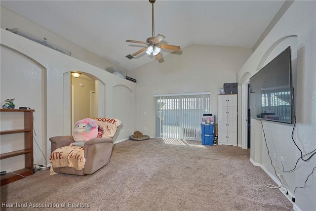4703 Benton St, Lake Wales, FL 33859 - sitting room featuring arched walkways, a ceiling fan, carpet floors, and high vaulted ceiling