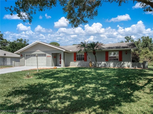 5808 Twisted Oaks Dr, Sebring, FL 33876 - single story home with a garage, a front lawn, concrete driveway, and stucco siding