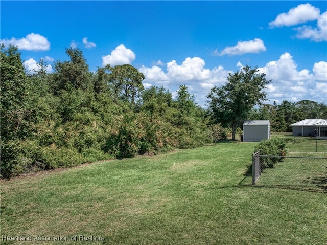 5808 Twisted Oaks Dr, Sebring, FL 33876 - view of yard with an outbuilding and a shed