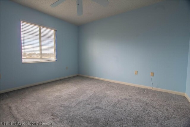 bedroom with ceiling fan, light carpet, and a closet