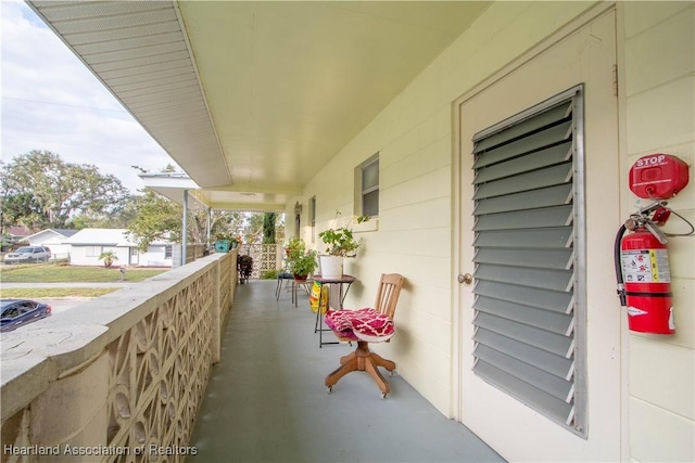 balcony featuring covered porch