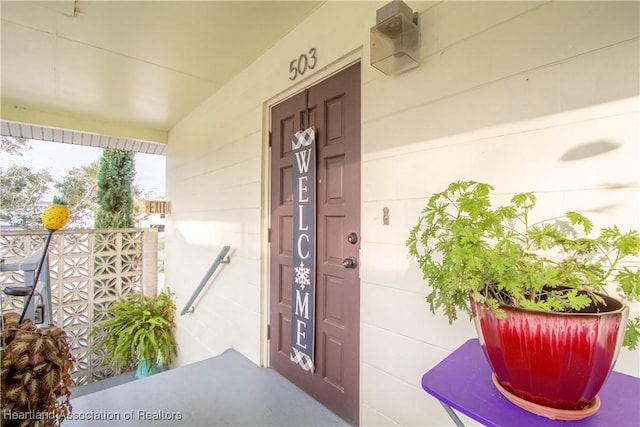 entrance to property with a porch