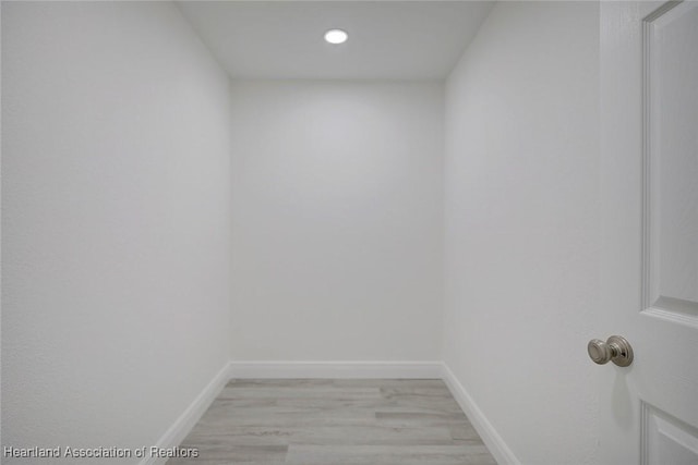 spare room featuring light hardwood / wood-style flooring