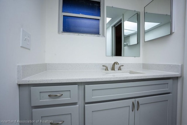 bathroom featuring vanity