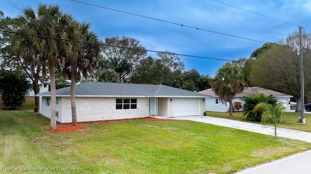 ranch-style house featuring a garage and a front yard