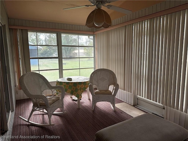 sunroom with ceiling fan