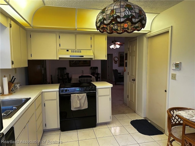 kitchen featuring ceiling fan, light tile patterned floors, black electric range oven, and sink