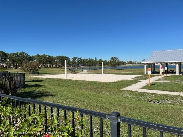 view of home's community with a gazebo, a lawn, and volleyball court