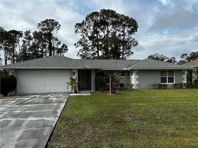 ranch-style home featuring a garage and a front yard