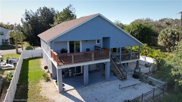 rear view of house with a patio