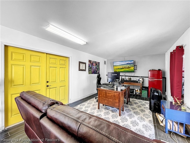 living room with dark hardwood / wood-style flooring