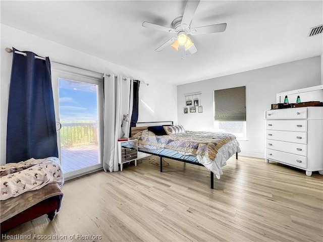 bedroom with ceiling fan, access to exterior, and light hardwood / wood-style flooring