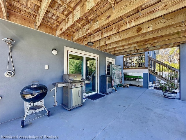 view of patio with a grill