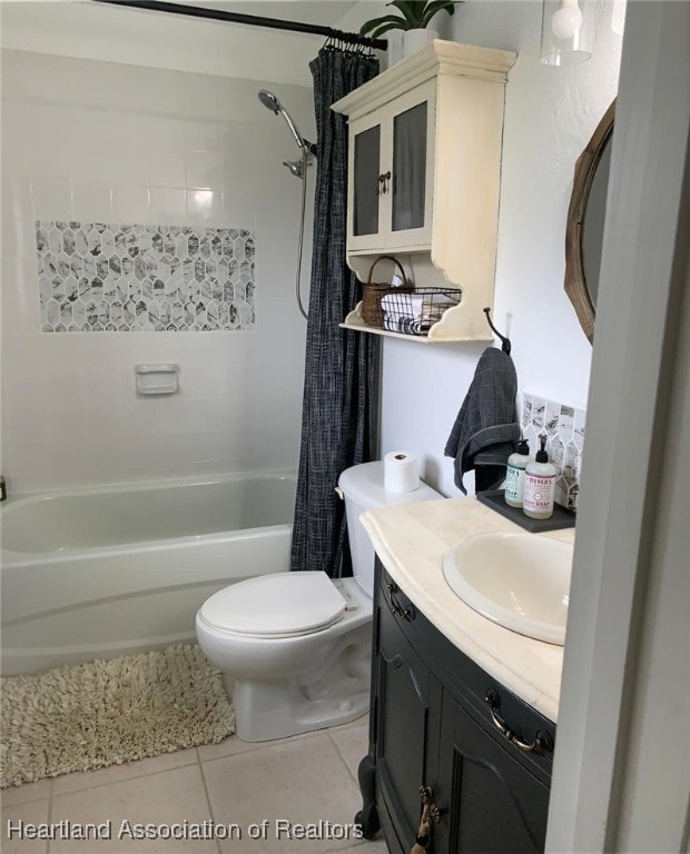 2010 W Royalton Rd, Avon Park, FL 33825 - full bathroom featuring tile patterned floors, shower / tub combo with curtain, and vanity
