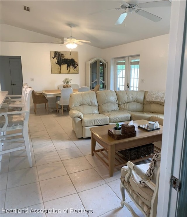 2010 W Royalton Rd, Avon Park, FL 33825 - living room featuring ceiling fan, french doors, lofted ceiling, and light tile patterned floors