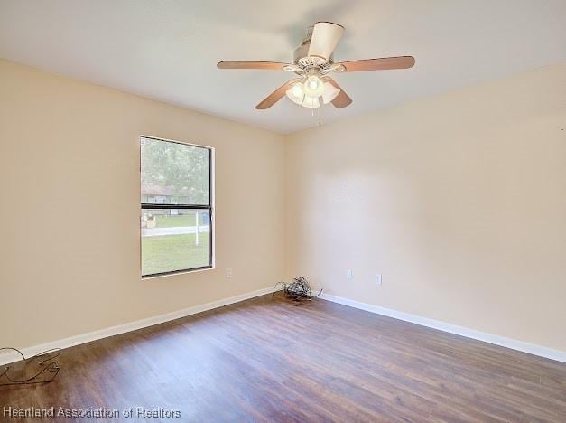 1916 Melady Ave, Sebring, FL 33870 - empty room with wood finished floors and ceiling fan