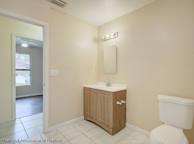 1916 Melady Ave, Sebring, FL 33870 - bathroom featuring vanity and tile patterned floors