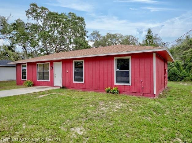 1916 Melady Ave, Sebring, FL 33870 - ranch-style home with a front yard