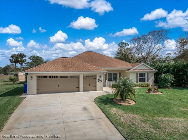 ranch-style home featuring a garage and a front lawn