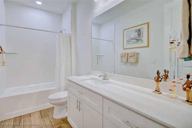 full bathroom with vanity, shower / bathtub combination with curtain, and toilet