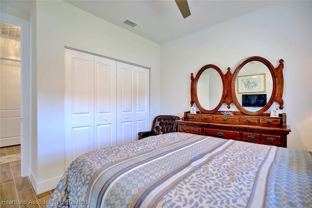 bedroom with a closet and ceiling fan