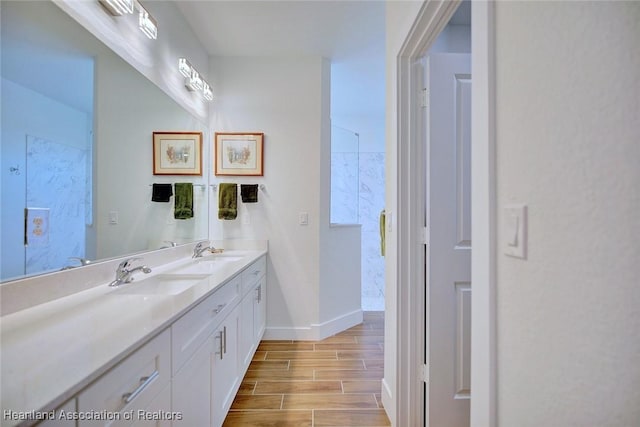 bathroom featuring vanity and walk in shower