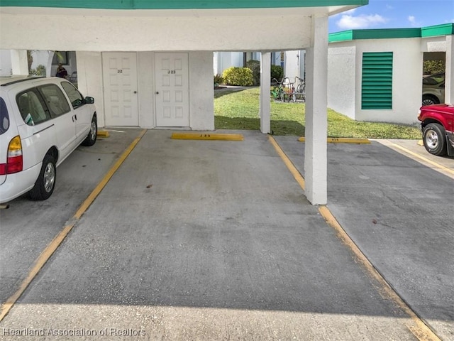 garage featuring a yard