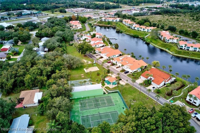 birds eye view of property featuring a water view