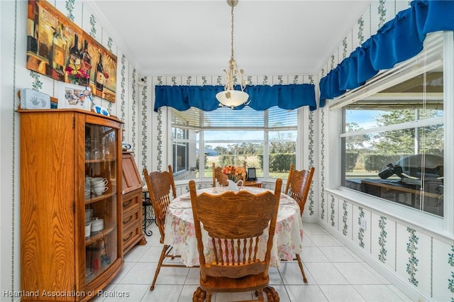 tiled dining space with ornamental molding