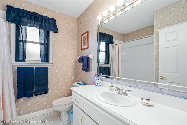 bathroom with toilet, vanity, tile patterned floors, and a shower with shower curtain