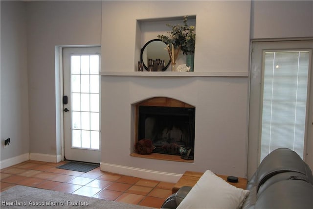 living room with light tile patterned floors