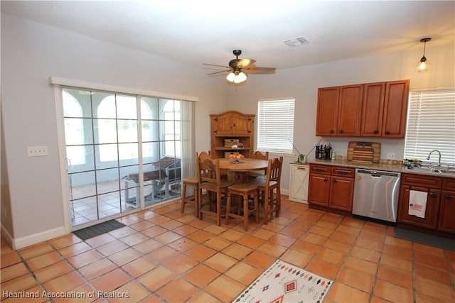 kitchen featuring ceiling fan, sink, pendant lighting, light tile patterned floors, and dishwasher