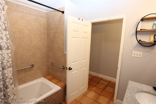 bathroom featuring tile patterned floors, sink, and shower / bath combination with curtain