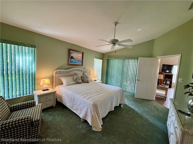 bedroom with lofted ceiling, carpet, visible vents, and a ceiling fan