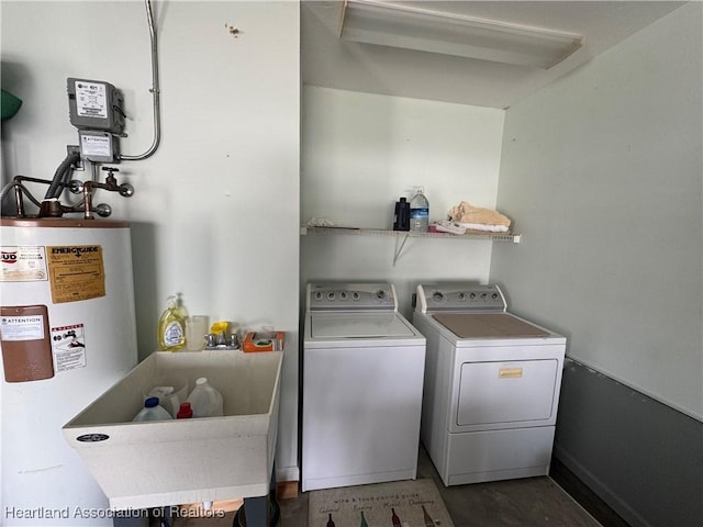 clothes washing area featuring laundry area and washing machine and dryer