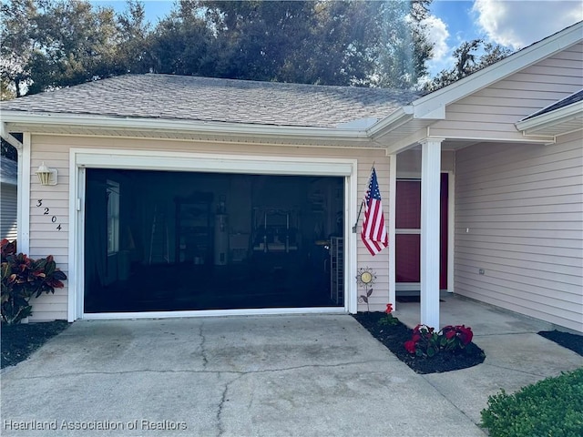 garage featuring driveway