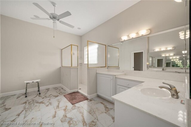 full bathroom featuring a ceiling fan, walk in shower, vanity, baseboards, and marble finish floor
