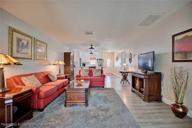 living room featuring light hardwood / wood-style floors