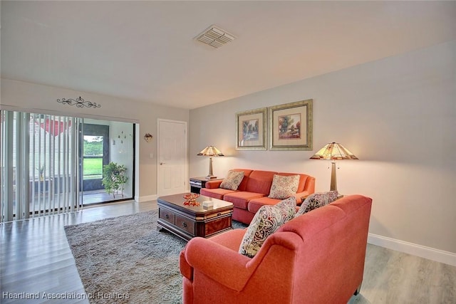 living room with hardwood / wood-style floors