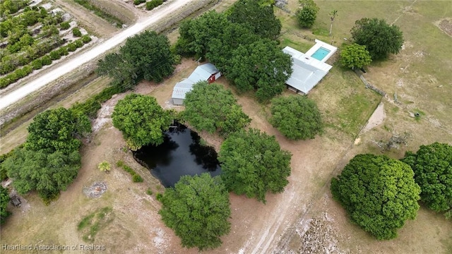 bird's eye view with a water view and a rural view