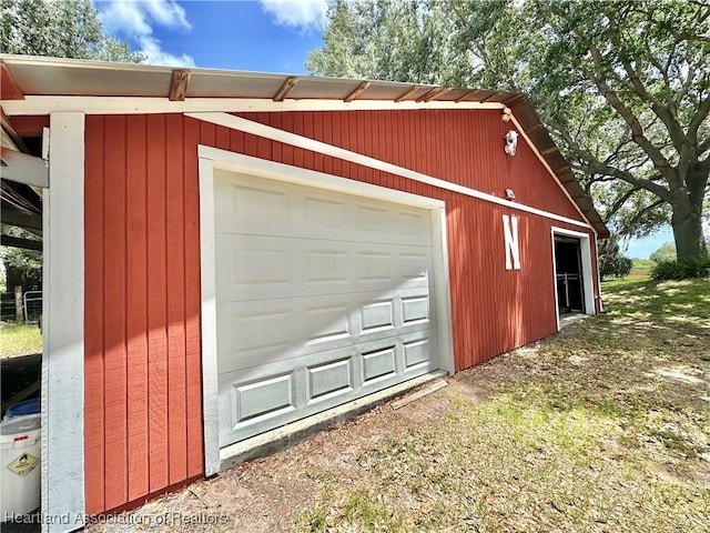 garage featuring driveway