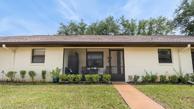 view of front of home with a front yard