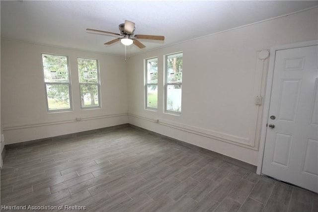 unfurnished room featuring ceiling fan